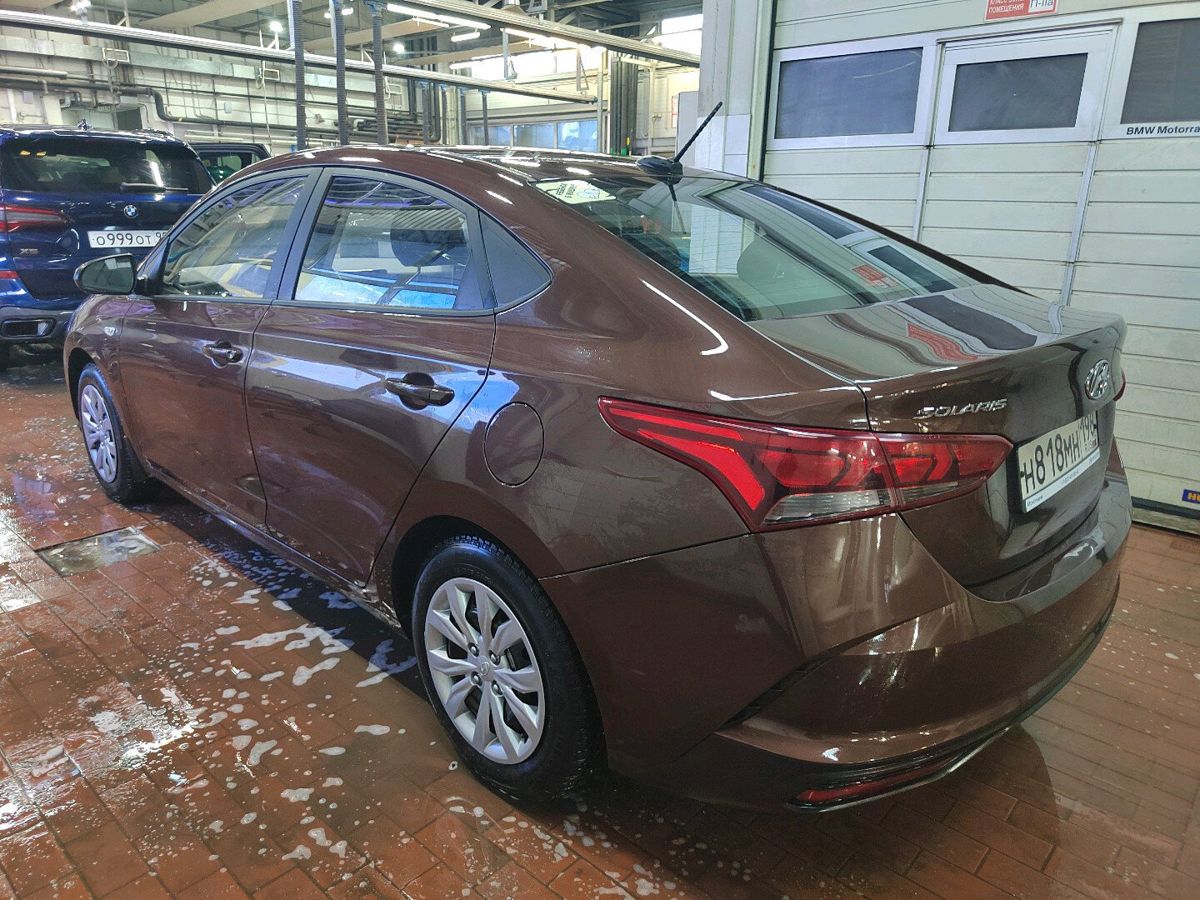 Автомобиль Hyundai Solaris II [рестайлинг] 1.6 AT (123 л.с.) Comfort + Winter Коричневый 2022 с пробегом 61 835 км