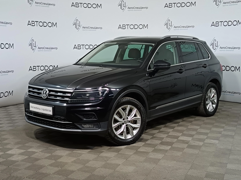 Автомобиль Volkswagen Tiguan II поколение 2.0 AMT 4WD (180 л.с.) Sportline Чёрный 2017 с пробегом 155 089 км