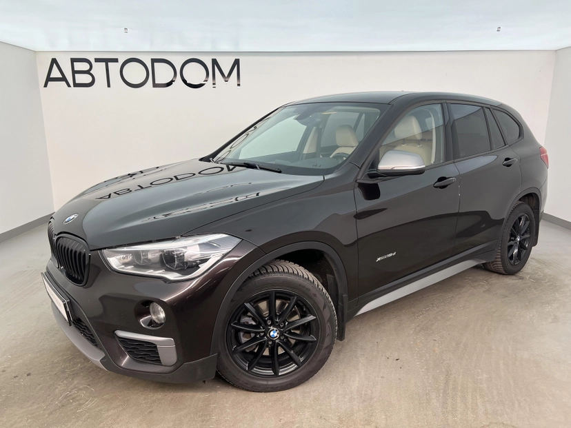 Автомобиль BMW X1 II поколение (F48) 2.0d AT 4WD (150 л.с.) Base Коричневый 2017 с пробегом 140 348 км