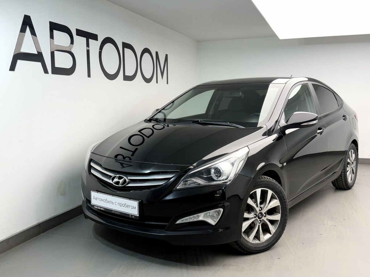 Автомобиль Hyundai Solaris I [рестайлинг] 1.6 AT (123 л.с.) Special Edition Чёрный 2014 с пробегом 128 479 км