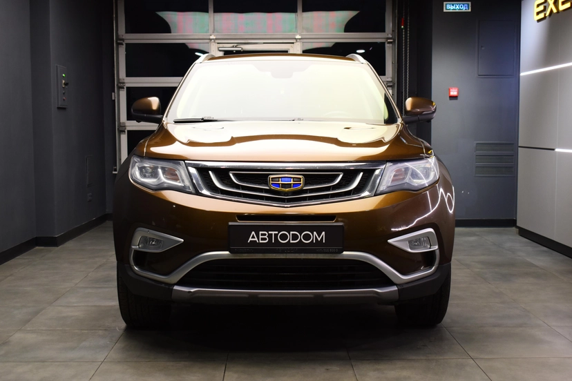 Автомобиль Geely Atlas I поколение 2.4 AT (149 л.с.) Luxury LED Коричневый 2020 с пробегом 119 067 км