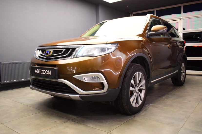 Автомобиль Geely Atlas I поколение 2.4 AT (149 л.с.) Luxury LED Коричневый 2020 с пробегом 119 067 км