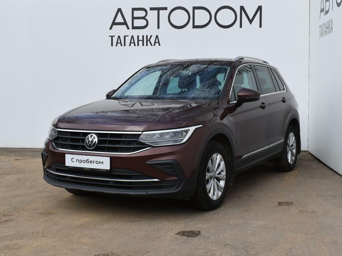 Автомобиль Volkswagen Tiguan II [рестайлинг] 2.0 AMT 4WD (180 л.с.) Respect Plus Коричневый 2021 с пробегом 115 172 км