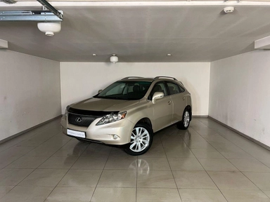 Автомобиль Lexus RX III поколение 300 3.5 AT 4WD (277 л.с.) Premium Бежевый 2011 с пробегом 67029 км