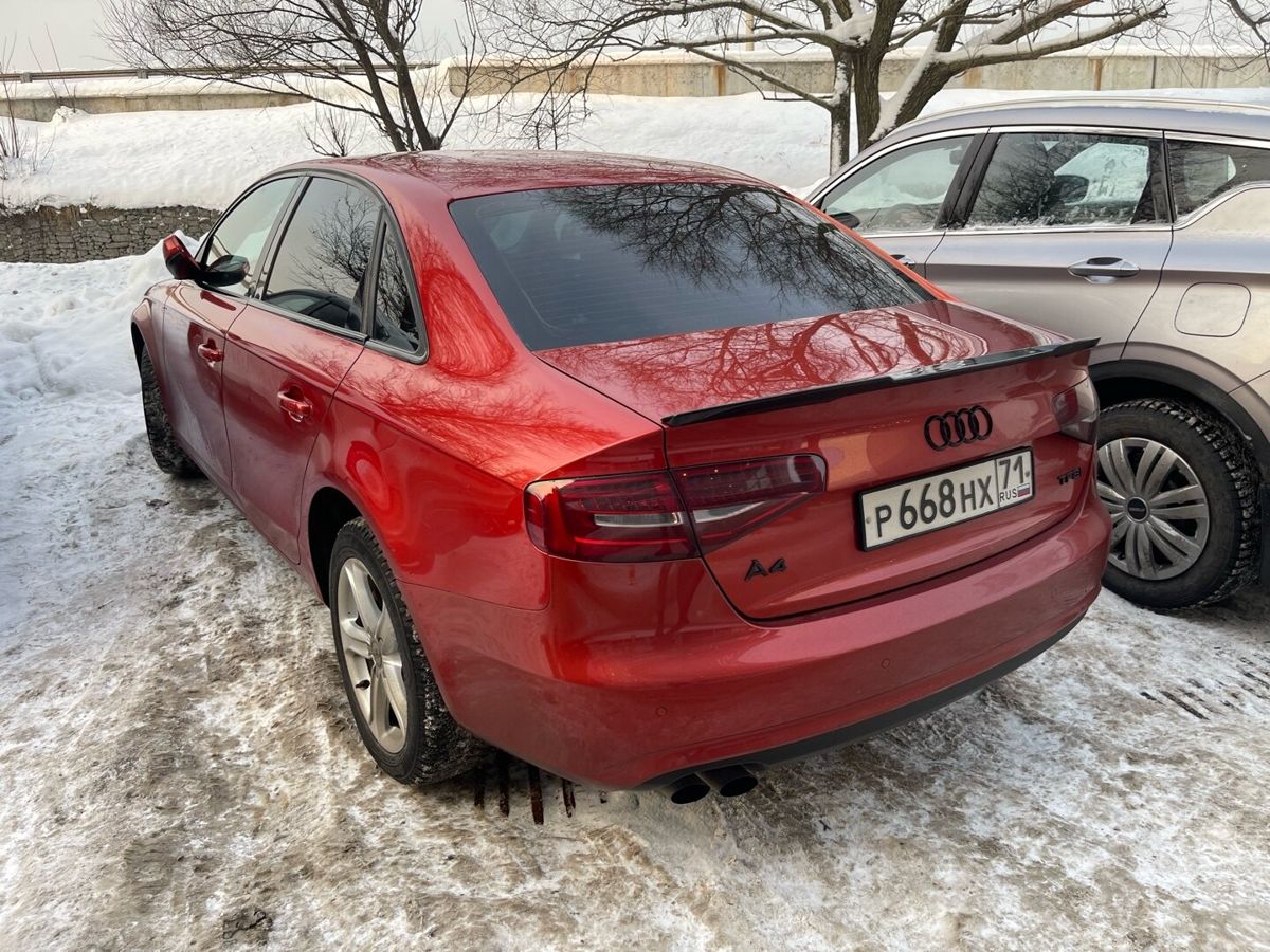 Автомобиль Audi A4 IV (B8) [рестайлинг] 2.0 AMT 4WD (211 л.с.) Base Красный 2012 с пробегом 151 234 км