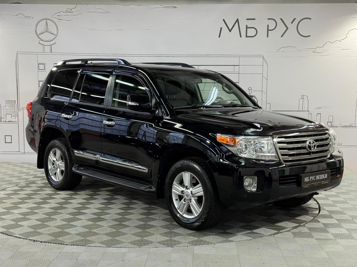 Автомобиль Toyota Land Cruiser IX (J200) [рестайлинг] 4.5d AT 4WD (5 мест) (235 л.с.) Люкс Чёрный 2014 с пробегом 145 981 км