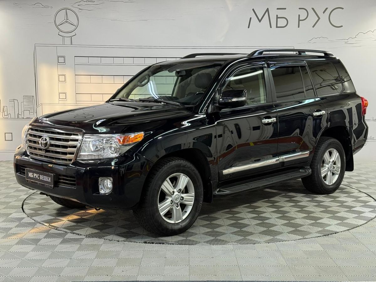 Автомобиль Toyota Land Cruiser IX (J200) [рестайлинг] 4.5d AT 4WD (5 мест) (235 л.с.) Люкс Чёрный 2014 с пробегом 145 981 км