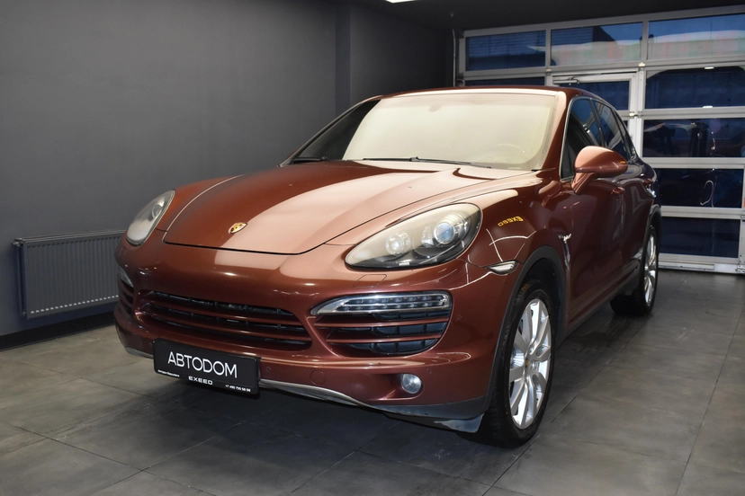 Автомобиль Porsche Cayenne II поколение (958) S 3.0hyb AT 4WD (333 л.с.) S Коричневый 2011 с пробегом 246 969 км