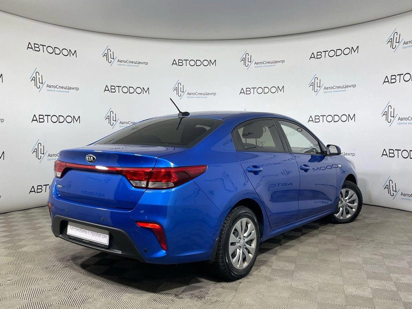 Автомобиль Kia Rio IV поколение 1.4 AT (100 л.с.) Comfort Синий 2018 с пробегом 46 463 км