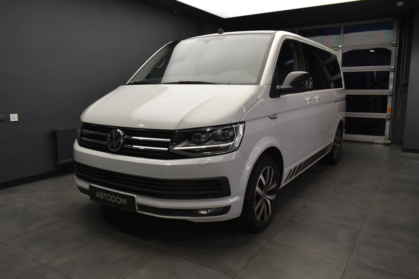 Автомобиль Volkswagen Multivan IV поколение (T6) 2.0 AMT 4WD (204 л.с.) Base Белый 2016 с пробегом 271 252 км