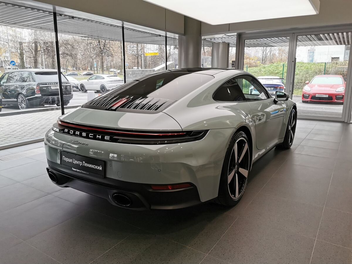Автомобиль Porsche 911 VIII (992) [рестайлинг] Carrera 3.0 AMT (394 л.с.) Carrera Зелёный 2025 с пробегом 38 км