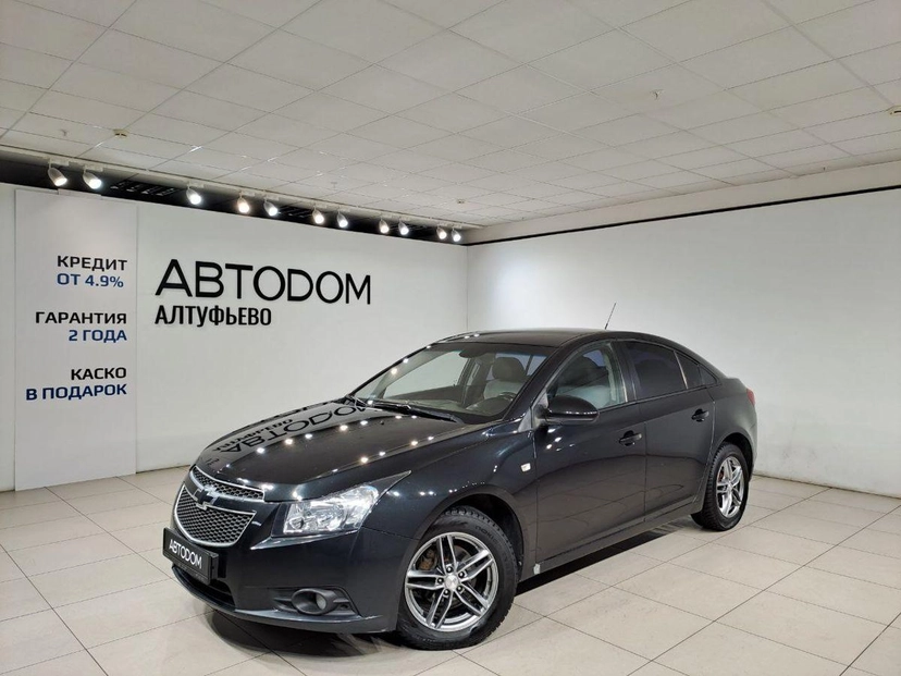 Автомобиль Chevrolet Cruze I поколение (J300) 1.6 AT (109 л.с.) LS Чёрный 2012 с пробегом 225 144 км