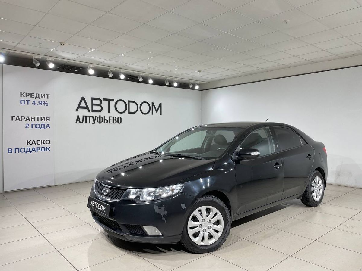 Автомобиль Kia Cerato II поколение 4-speed 1.6 AT (126 л.с.) Base Чёрный 2009 с пробегом 150 018 км