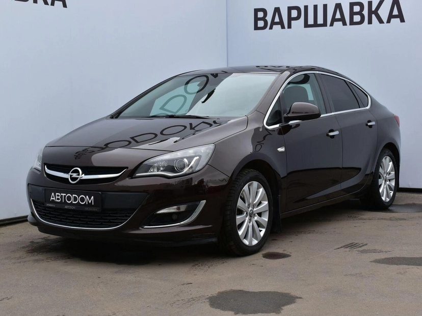 Автомобиль Opel Astra IV (J) [рестайлинг] 1.6 AT (180 л.с.) Base Коричневый 2013 с пробегом 119 000 км