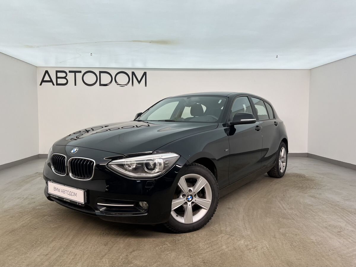 Автомобиль BMW 1 серии II поколение (F20/F21) 116 1.6 AT (136 л.с.) Base Чёрный 2014 с пробегом 45 000 км