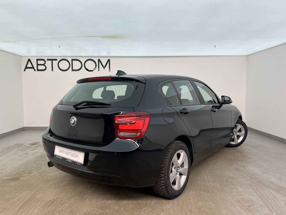 Автомобиль BMW 1 серии II поколение (F20/F21) 116 1.6 AT (136 л.с.) Base Чёрный 2014 с пробегом 45 000 км
