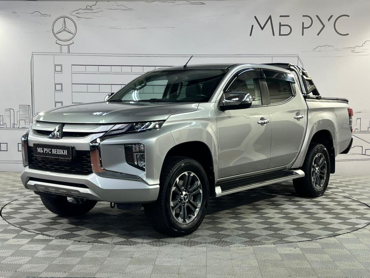 Автомобиль Mitsubishi L200 V [рестайлинг] 2.4d AT 4WD (181 л.с.) Instyle Серебристый 2022 с пробегом 38 000 км