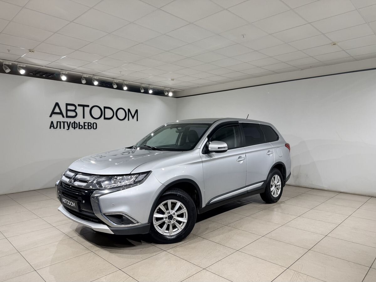 Mitsubishi Outlander III [2-й рестайлинг] 2.0 CVT 4WD (146 л.с.) Invite Серебристый 2015 с пробегом 140 381 км