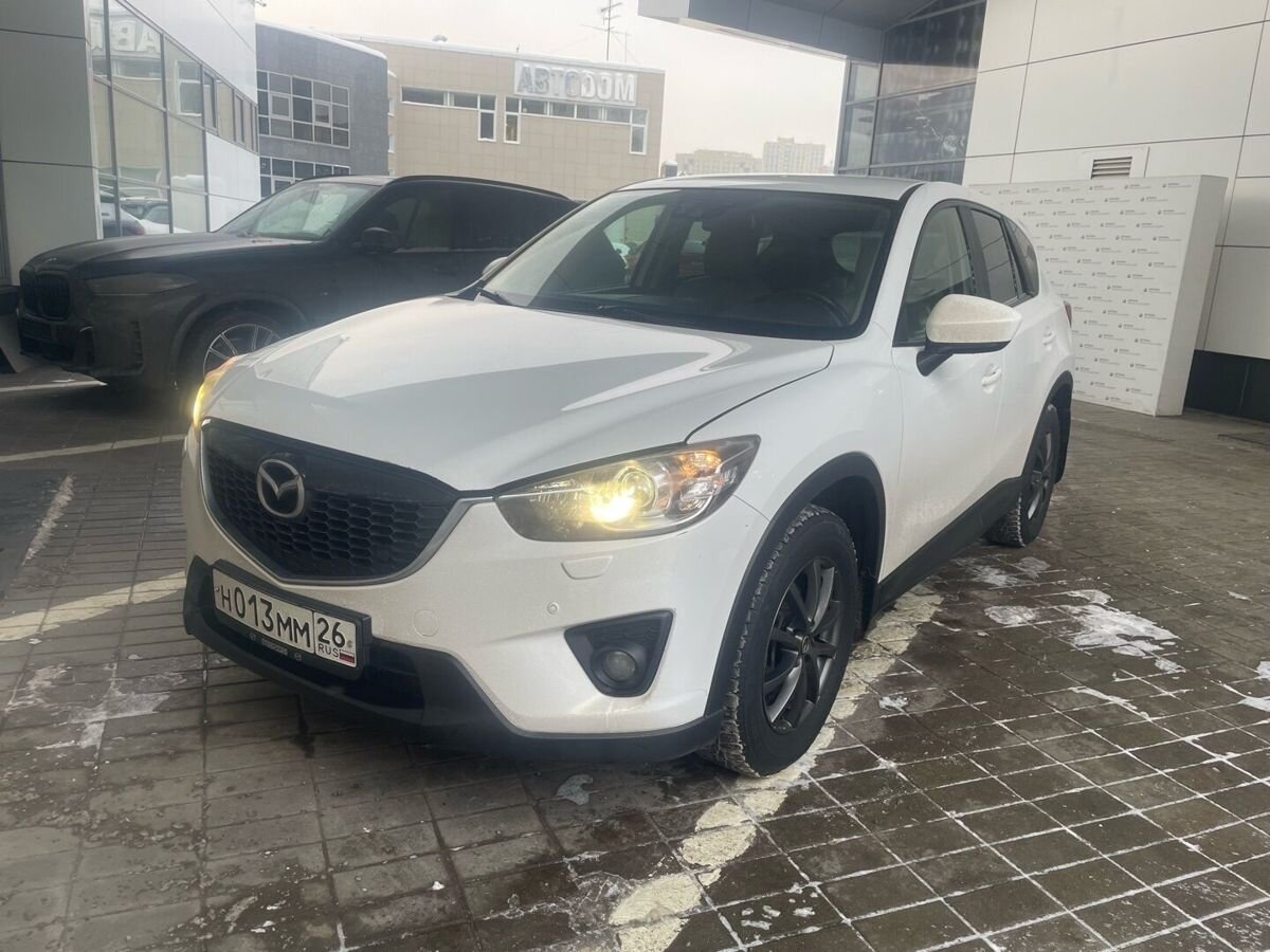Автомобиль Mazda CX-5 I поколение 2.5 AT 4WD (192 л.с.) Supreme Белый 2013 с пробегом 106 342 км