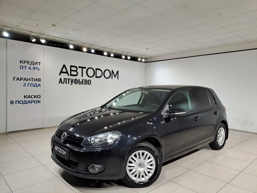 Автомобиль Volkswagen Golf VI поколение 1.6 AMT (102 л.с.) Trendline Чёрный 2011 с пробегом 165 919 км