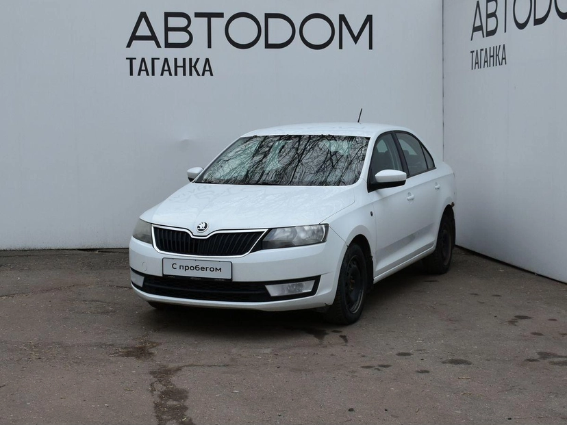 Автомобиль Skoda Rapid I поколение 1.6 MT (110 л.с.) Base Белый 2016 с пробегом 228 940 км