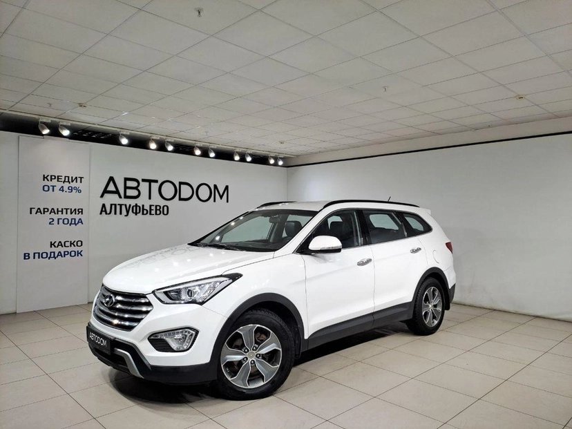 Автомобиль Hyundai Santa Fe III поколение (DM) 2.2d AT 4WD (197 л.с.) Family Белый 2015 с пробегом 211 306 км