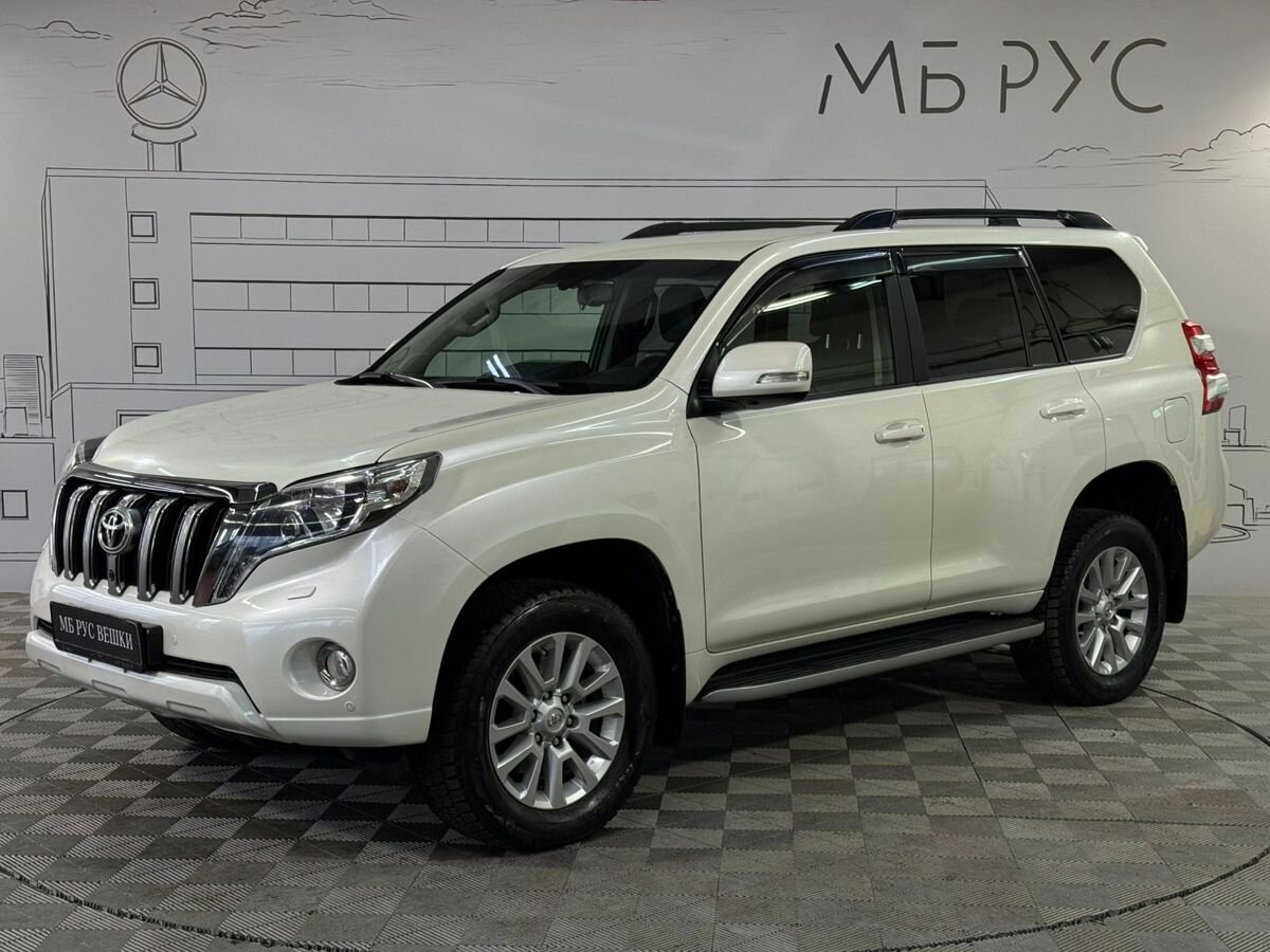 Автомобиль Toyota Land Cruiser Prado IV (J150) [1-й рестайлинг] 2.8d AT 4WD (5 мест) (177 л.с.) Престиж Белый 2016 с пробегом 75 000 км