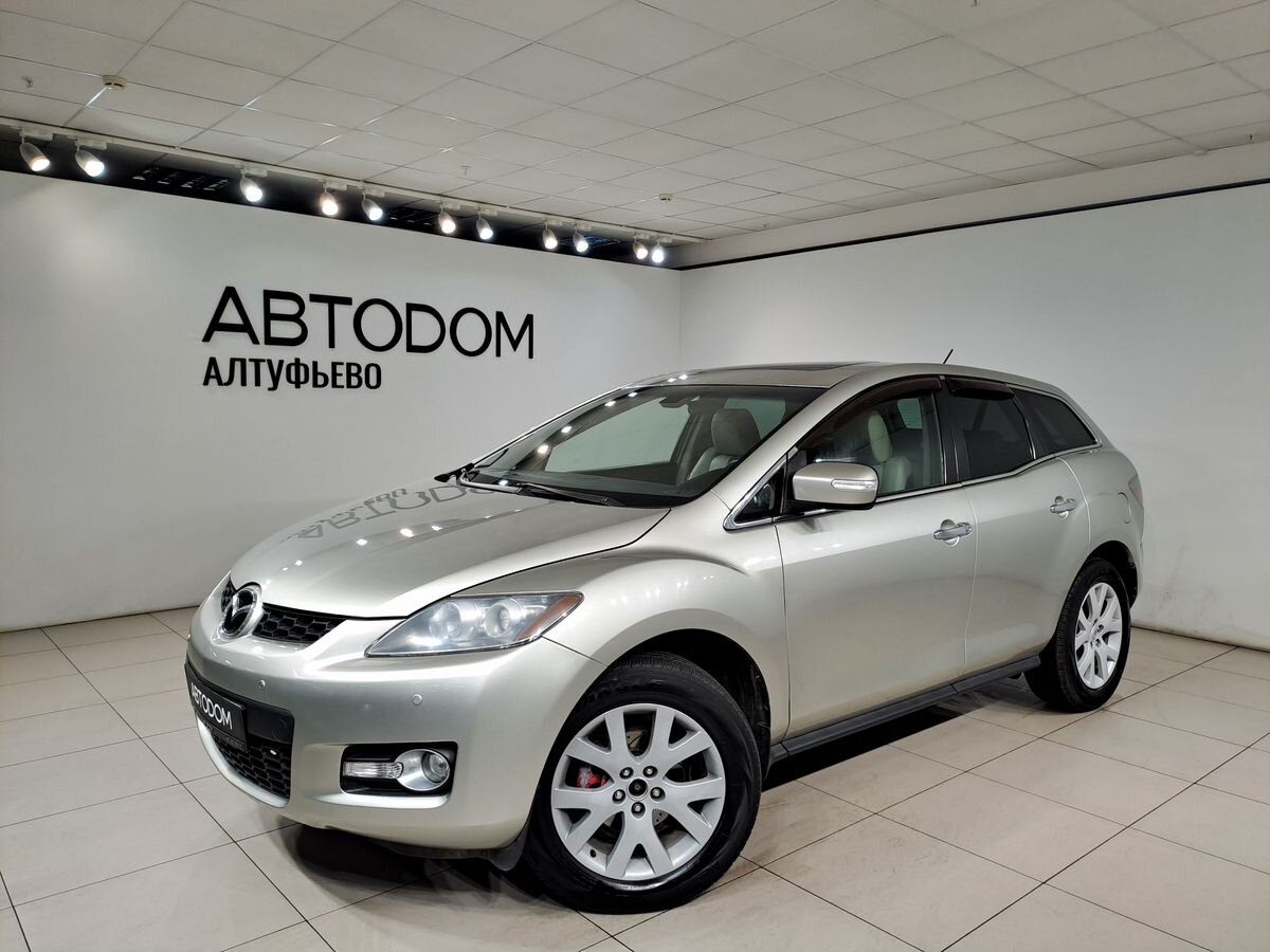 Mazda CX-7 I поколение 2.3 AT 4WD (238 л.с.) Sport Золотой 2007 с пробегом 267 780 км