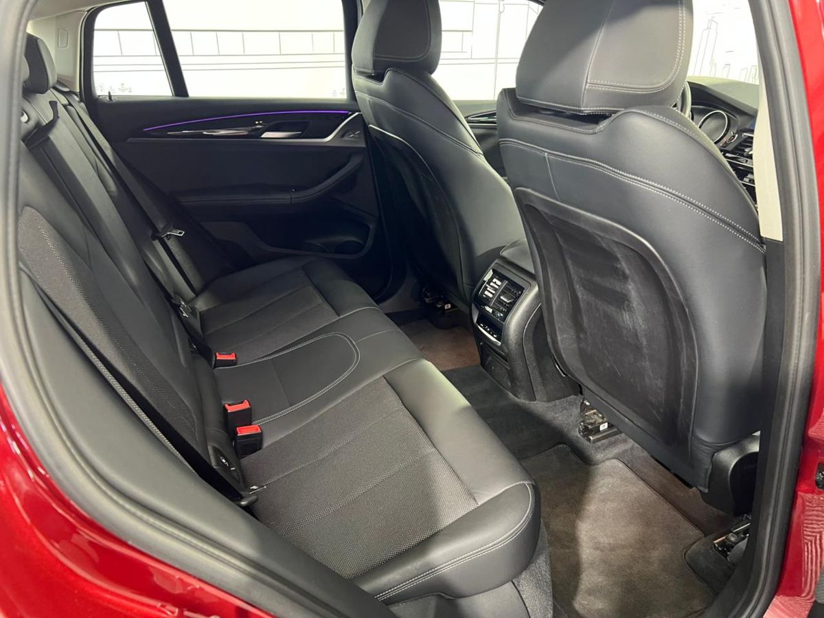 Автомобиль BMW X4 II поколение (G02) 2.0 AT 4WD (184 л.с.) Lifestyle Красный 2019 с пробегом 53 825 км