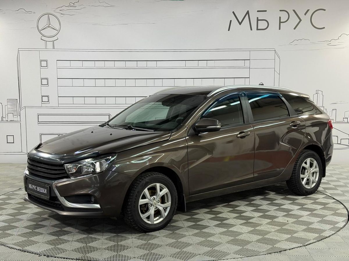 Автомобиль Lada (ВАЗ) Vesta I поколение 1.6 MT (106 л.с.) Comfort Winter Коричневый 2017 с пробегом 137 357 км