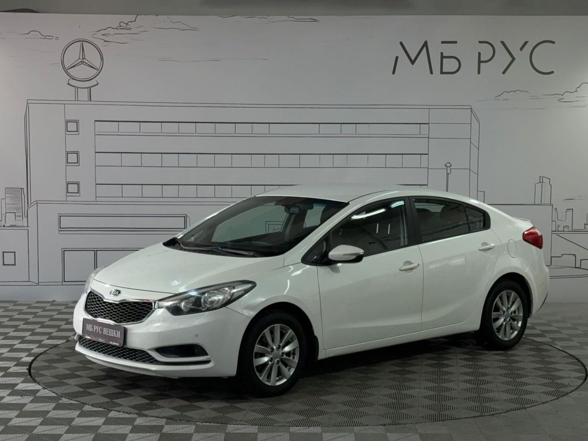 Автомобиль Kia Cerato III поколение 2.0 AT (150 л.с.) Prestige Белый 2014 с пробегом 191 000 км