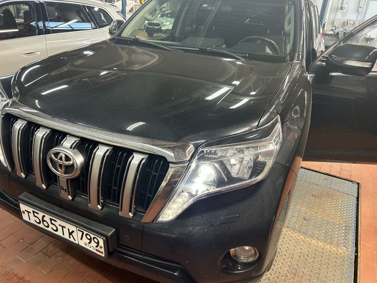Автомобиль Toyota Land Cruiser Prado IV (J150) [1-й рестайлинг] 2.8d AT 4WD (5 мест) (177 л.с.) Base Чёрный 2016 с пробегом 238 334 км