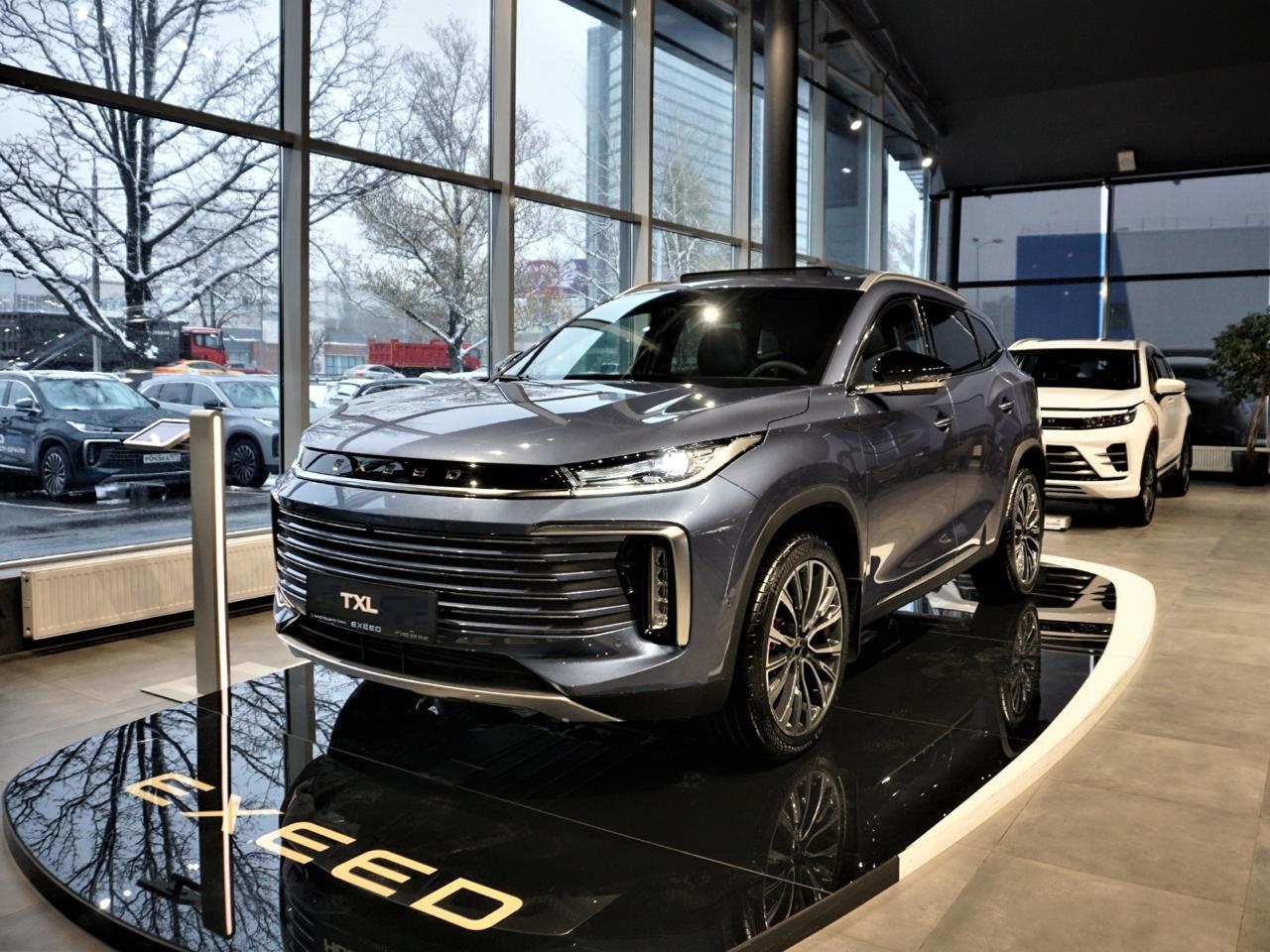 Автомобиль EXEED TXL I [2-й рестайлинг] 1.6 AMT 4WD (194 л.с.) Prestige Синий 2024 