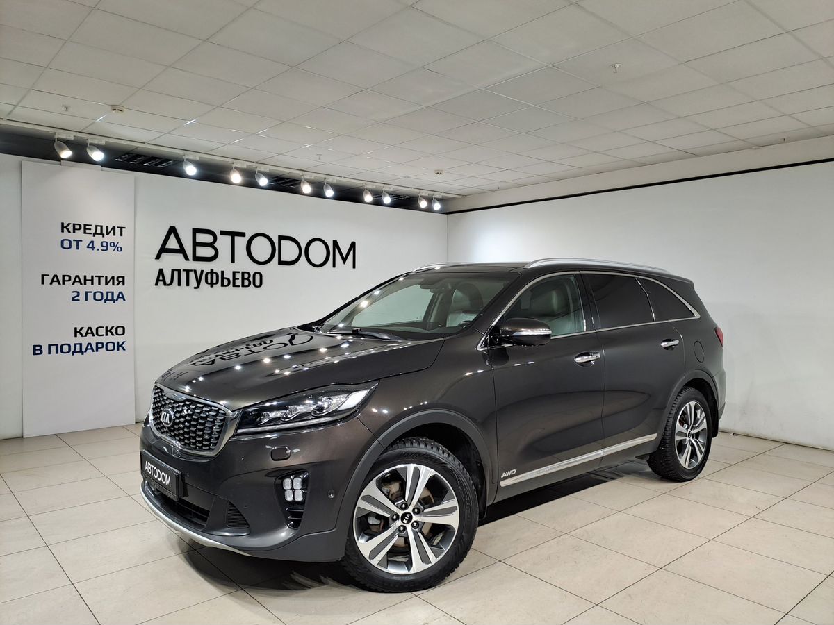 Автомобиль Kia Sorento III [рестайлинг] 2.2d AT 4WD (200 л.с.) Premium Коричневый 2018 с пробегом 201 808 км