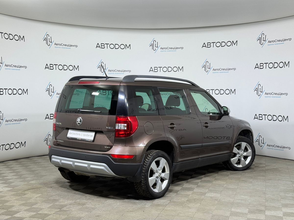 Автомобиль Skoda Yeti I [рестайлинг] 1.8 AMT 4WD (152 л.с.) Adventure Коричневый 2016 с пробегом 71 995 км