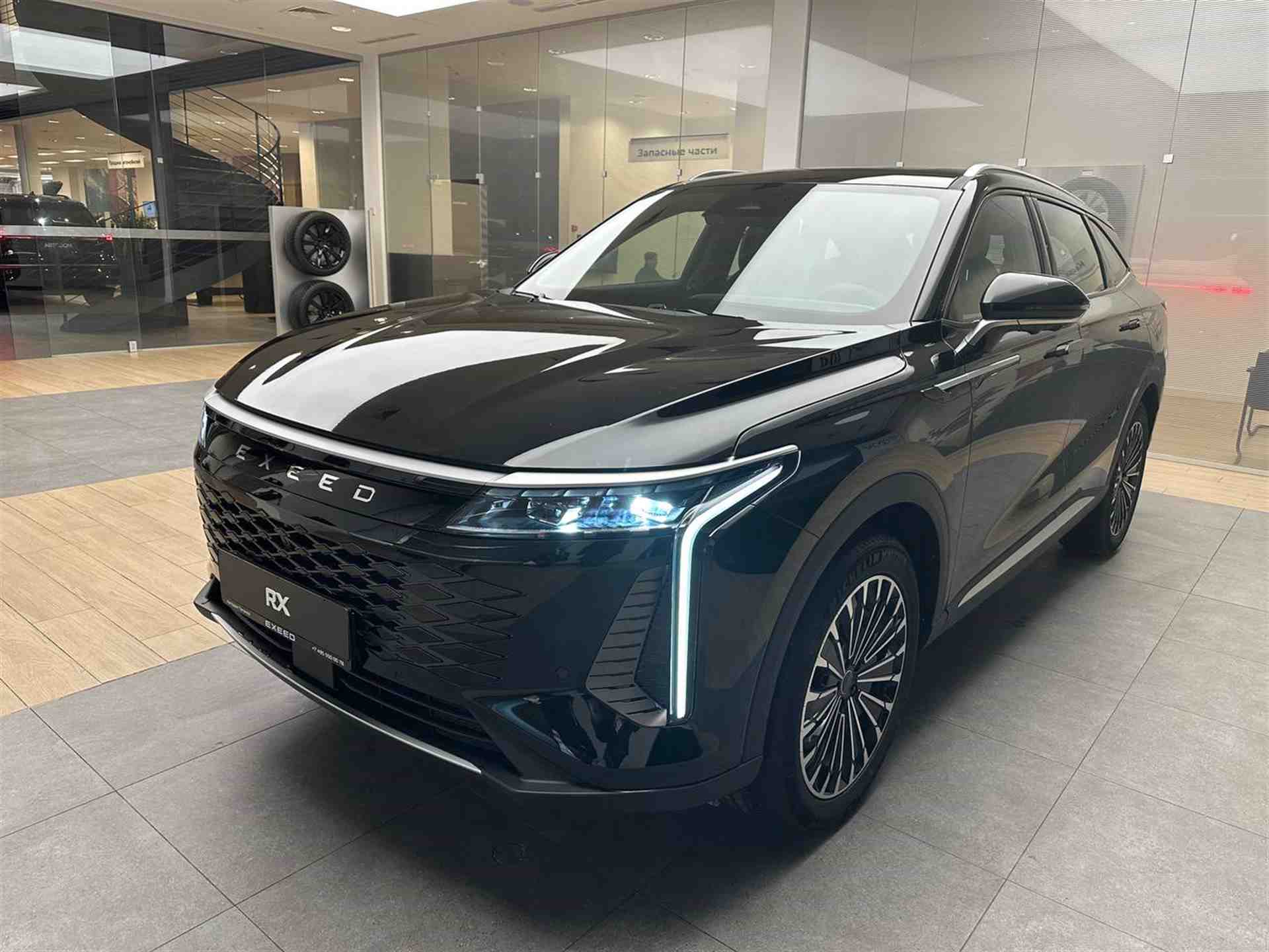 Автомобиль EXEED RX I поколение 2.0 AMT 4WD (197 л.с.) Urban Чёрный 2024 