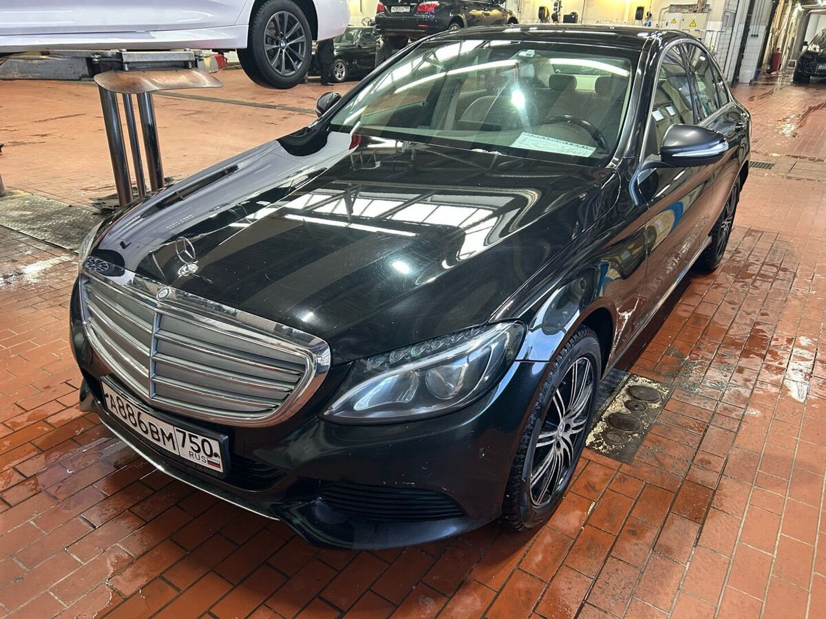 Автомобиль Mercedes-Benz C-Класс IV поколение (W205/S205/C205) 180 1.6 7AT (150 л.с.) Base Чёрный 2015 с пробегом 148 515 км