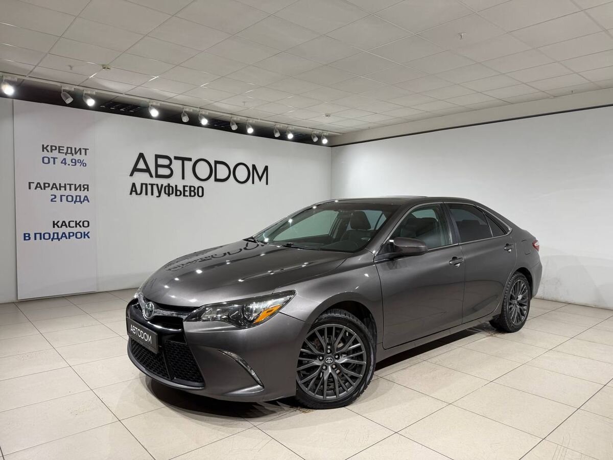 Автомобиль Toyota Camry VII (XV50) [рестайлинг] 2.5 AT (181 л.с.) Base Коричневый 2015 с пробегом 147 936 км