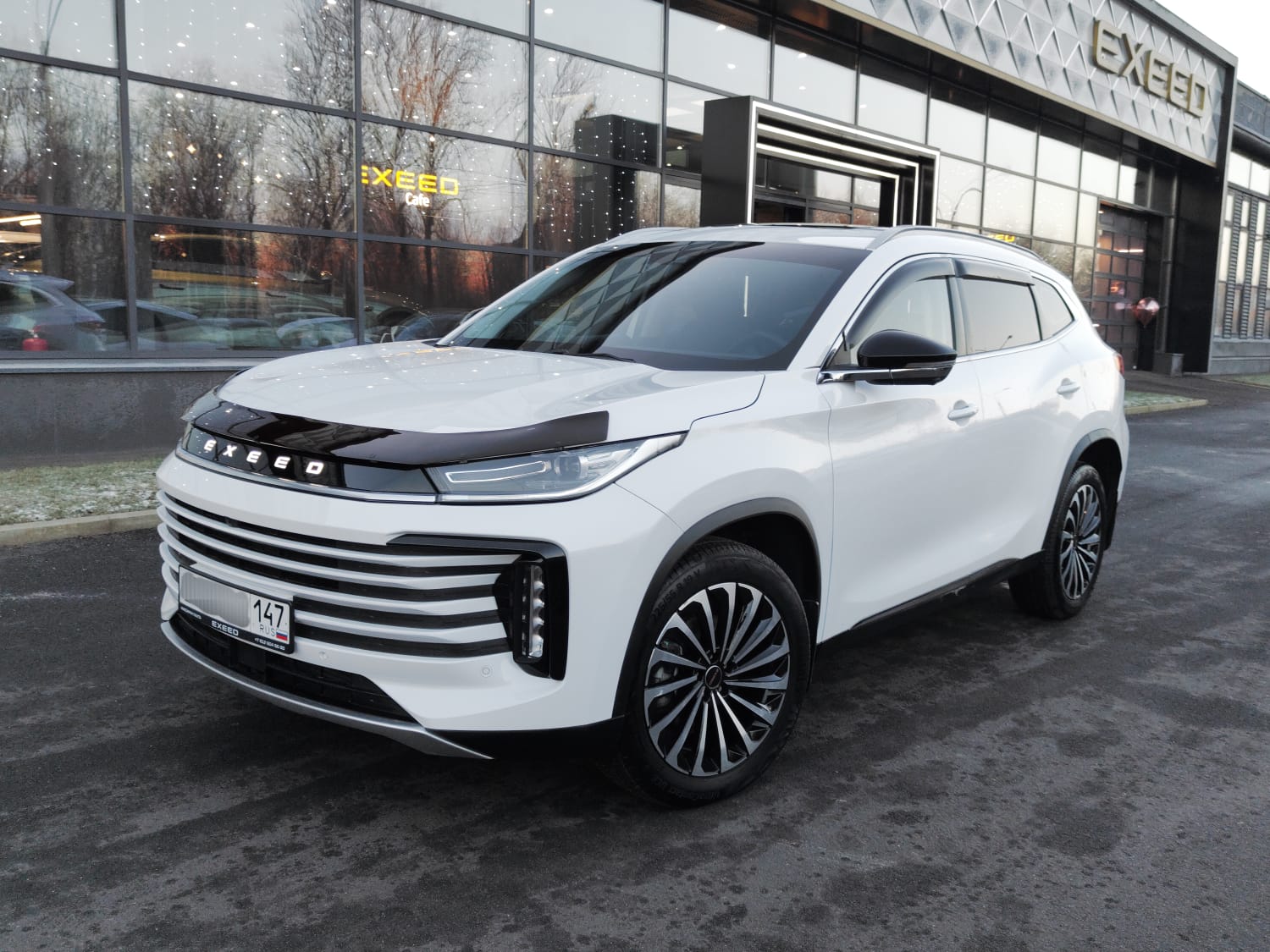 Автомобиль EXEED TXL I [рестайлинг] 1.6 AMT 4WD (186 л.с.) Flagship Белый 2023 с пробегом 26 802 км