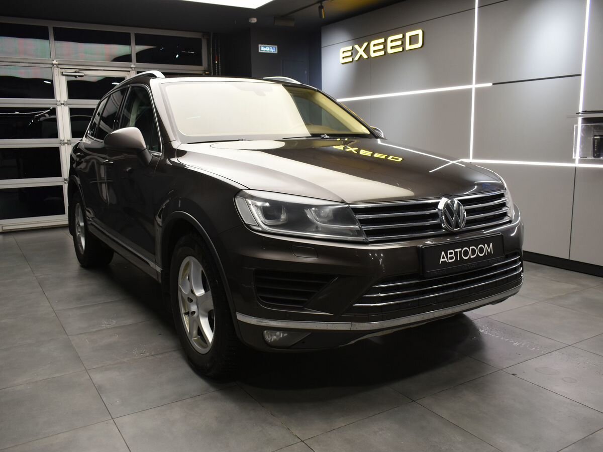 Автомобиль Volkswagen Touareg II [рестайлинг] 3.6 AT 4WD (249 л.с.) Base Коричневый 2015 с пробегом 303 557 км
