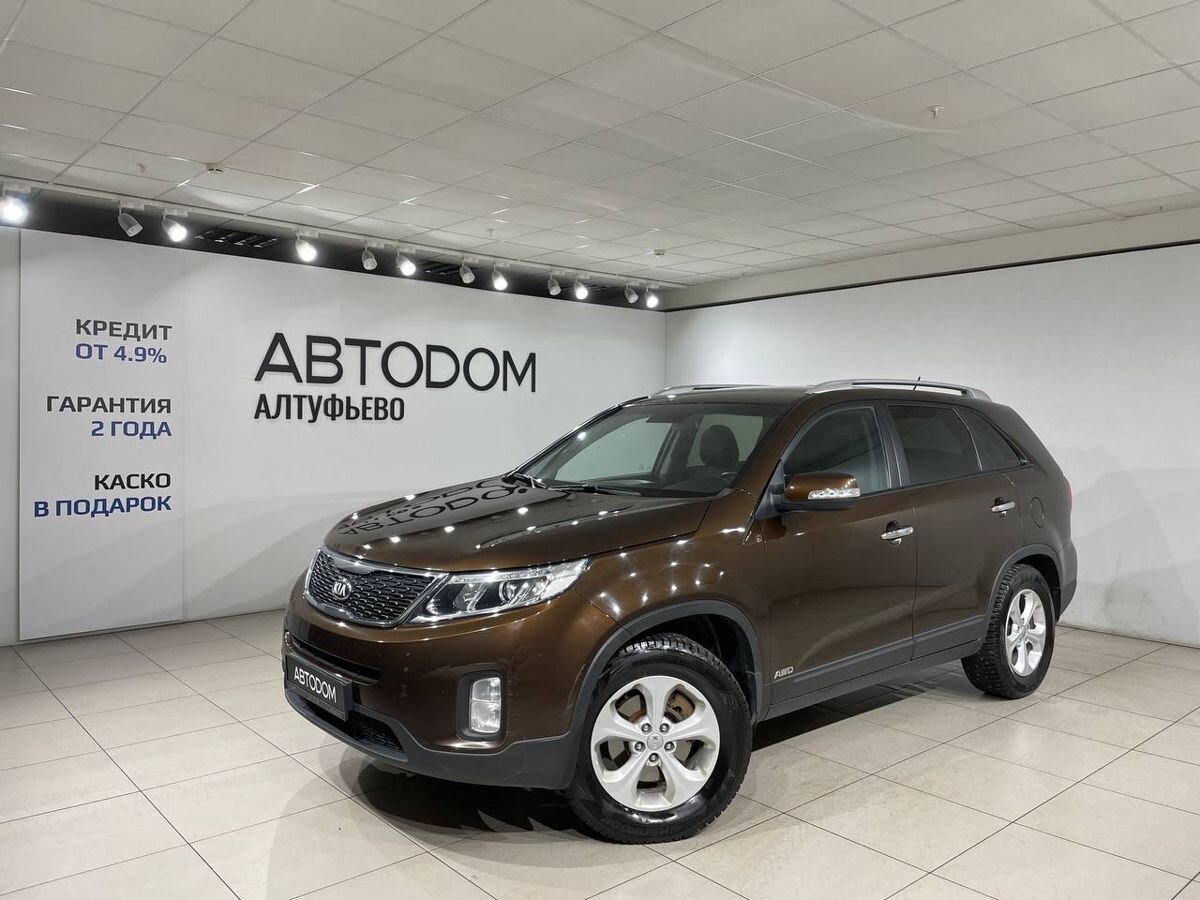 Автомобиль Kia Sorento II [рестайлинг] 2.4 MT 4WD (175 л.с.) Classic Коричневый 2014 с пробегом 227 022 км