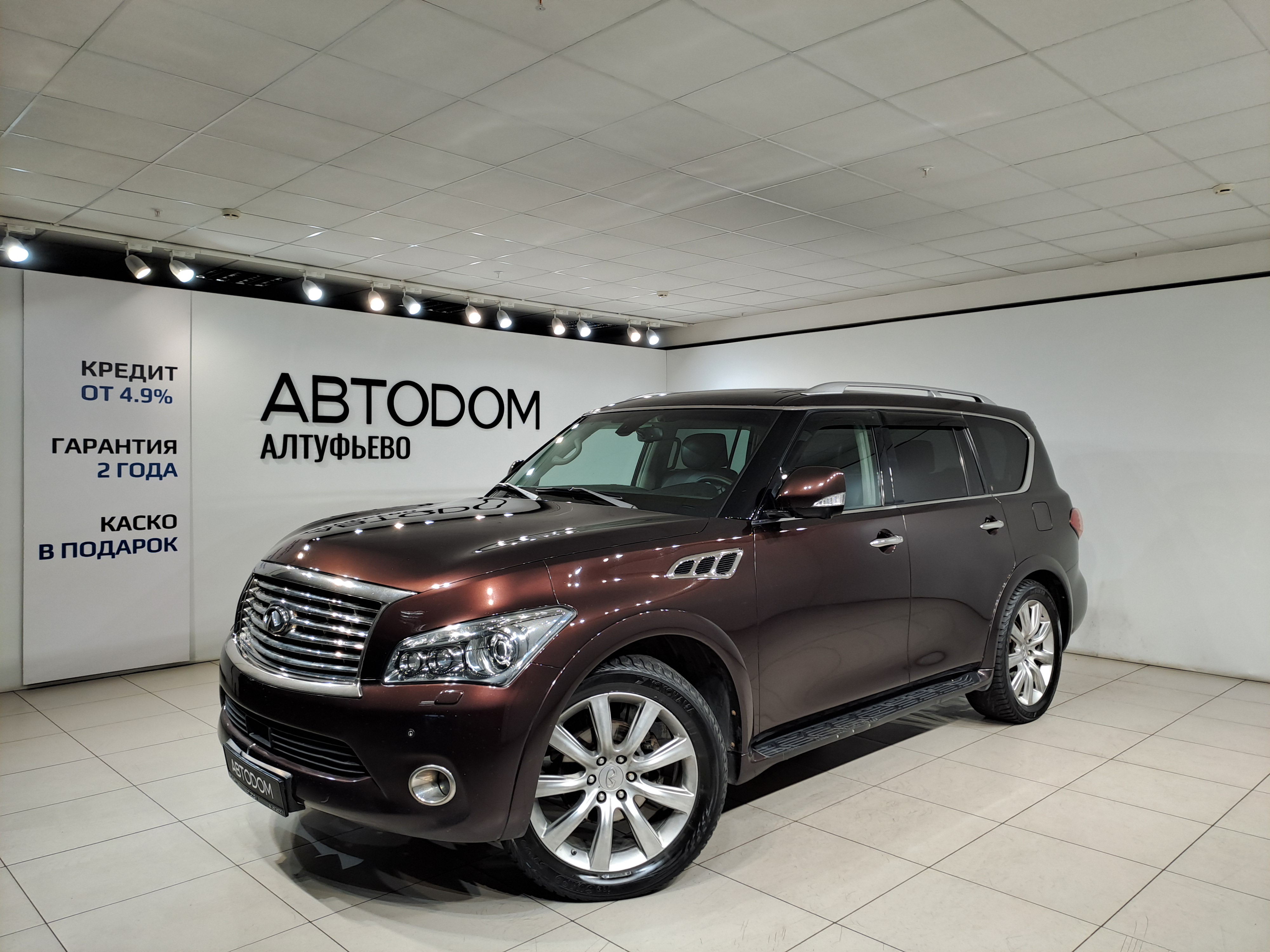 Автомобиль Infiniti QX56 II поколение 5.6 AT 4WD (405 л.с.) Hi-Tech Коричневый 2012 с пробегом 192 737 км