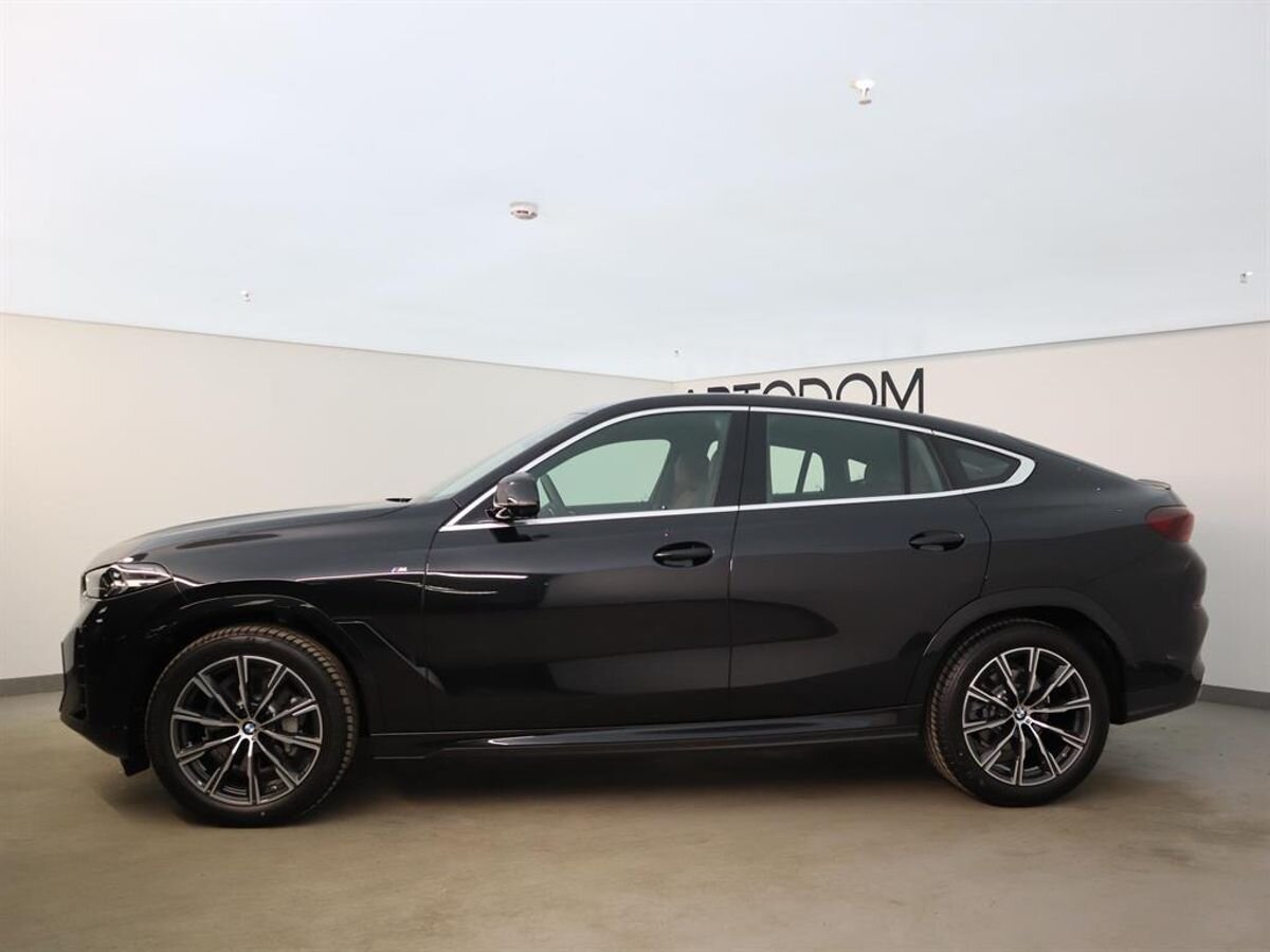 Автомобиль BMW X6 III (G06) [рестайлинг] 2.0 AT 4WD (258 л.с.) Base Чёрный 2024 