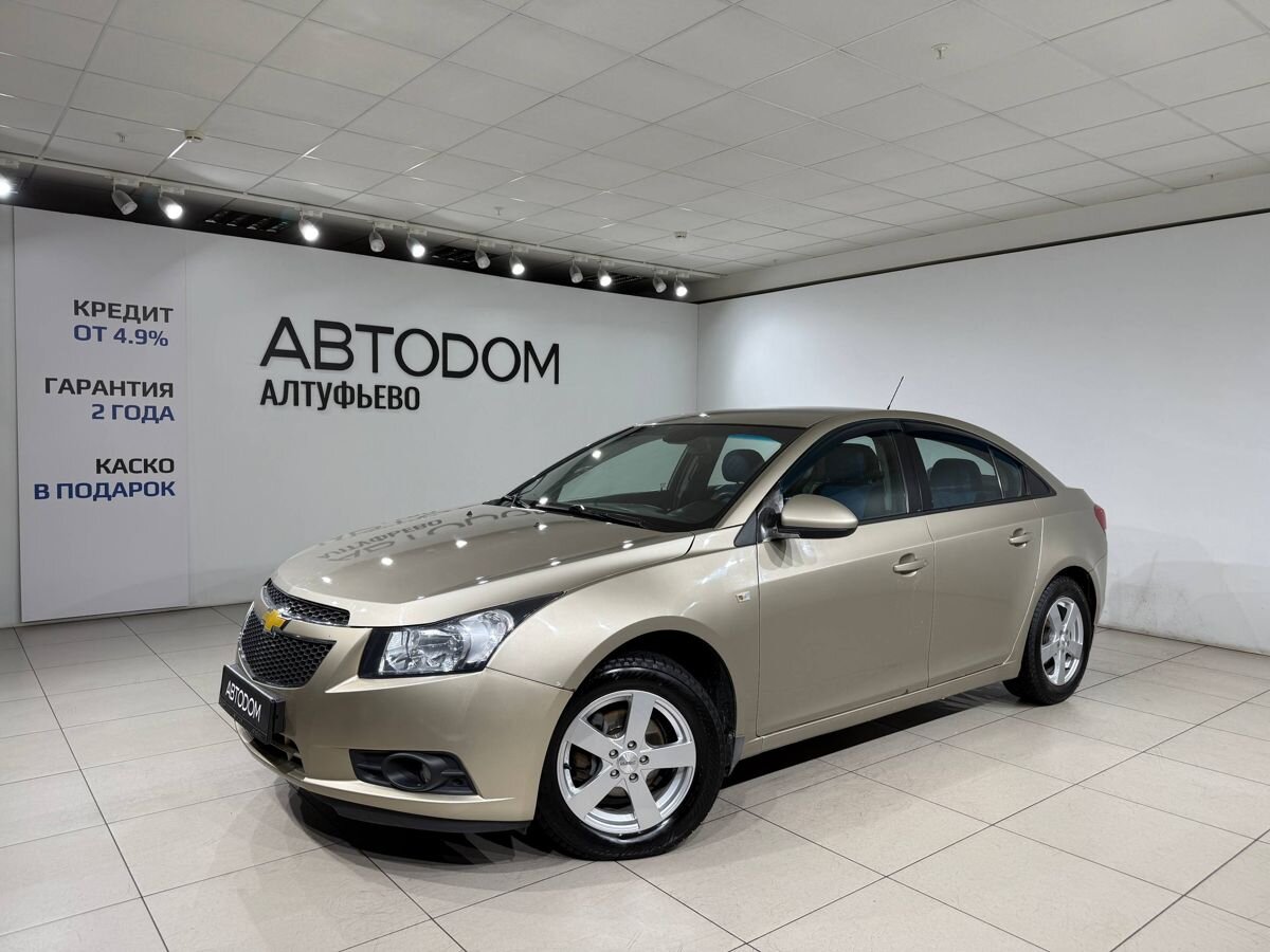 Автомобиль Chevrolet Cruze I поколение (J300) 1.8 AT (141 л.с.) LS Бежевый 2011 с пробегом 440 000 км