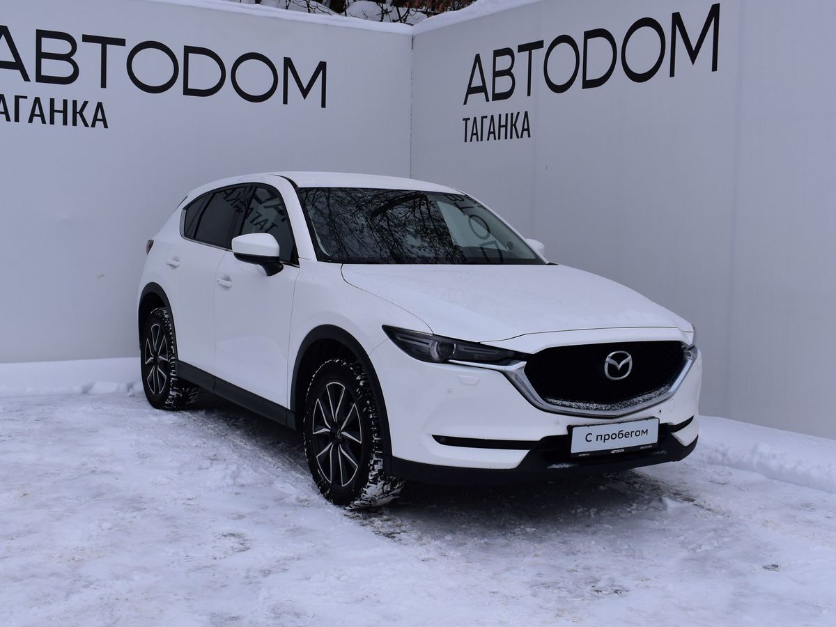 Автомобиль Mazda CX-5 II поколение 2.0 AT 4WD (150 л.с.) Supreme (Пакет 2) (2017-2020) Белый 2018 с пробегом 142 584 км