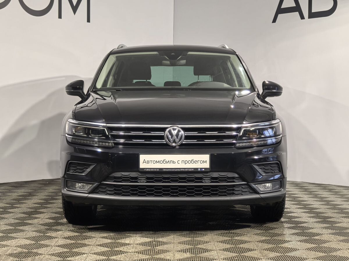 Автомобиль Volkswagen Tiguan II поколение 1.4 AMT 4WD (150 л.с.) Highline Чёрный 2020 с пробегом 104 565 км