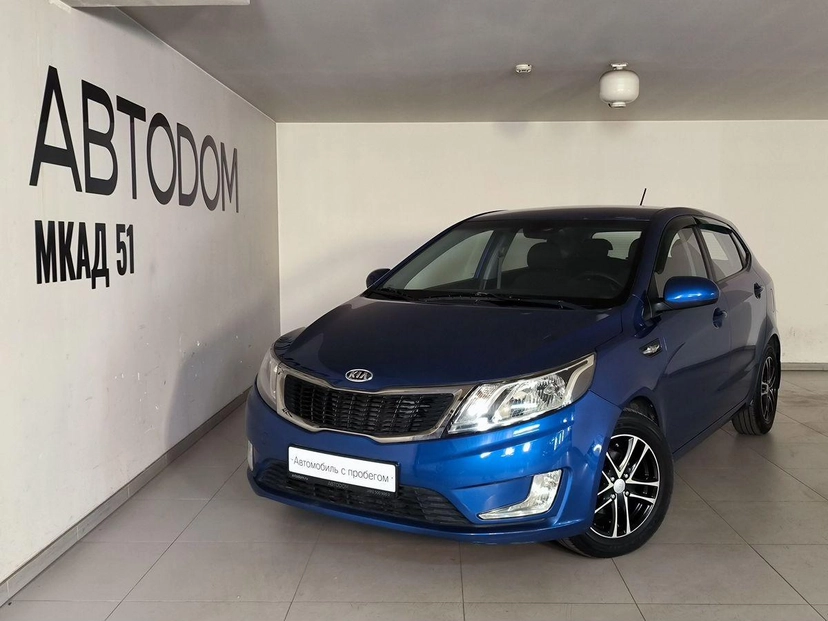 Автомобиль Kia Rio III поколение 1.6 4AT (123 л.с.) Prestige Синий 2012 с пробегом 63 760 км