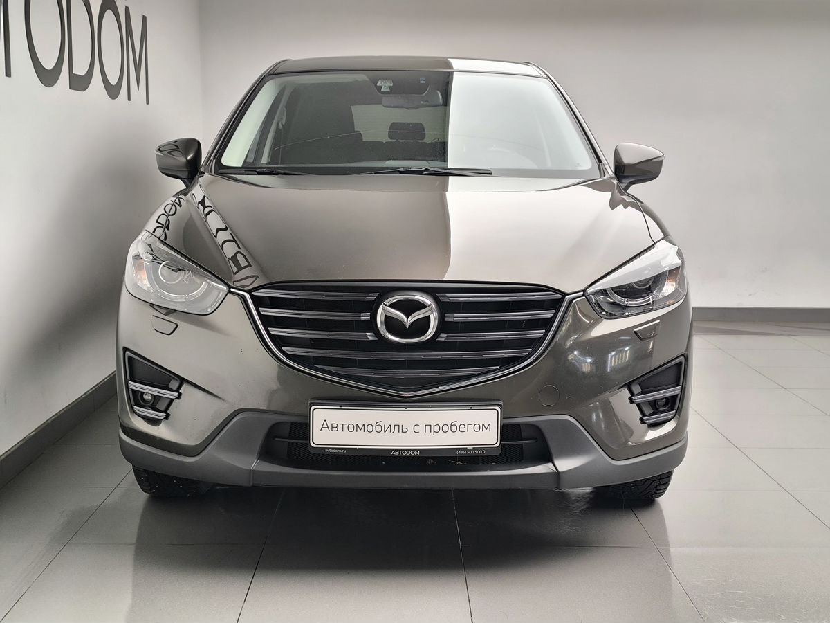 Автомобиль Mazda CX-5 I [рестайлинг] 2.0 AT (150 л.с.) Active Коричневый 2015 с пробегом 112 380 км