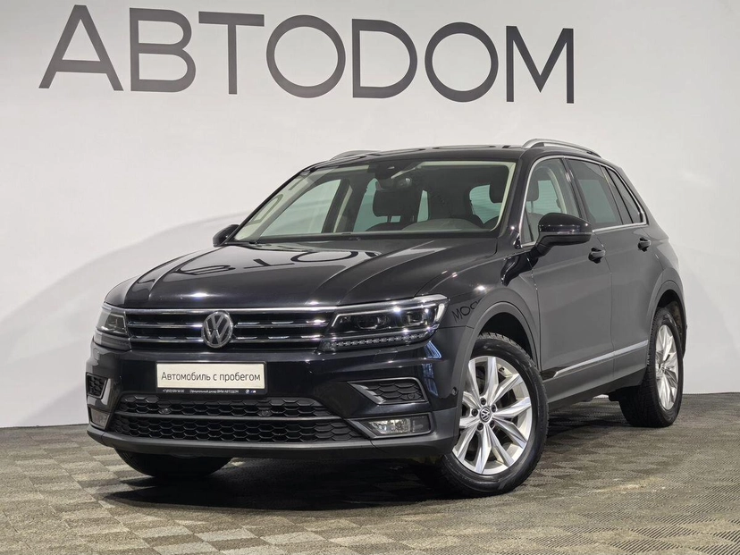 Автомобиль Volkswagen Tiguan II поколение 1.4 AMT 4WD (150 л.с.) Highline Чёрный 2020 с пробегом 104 565 км