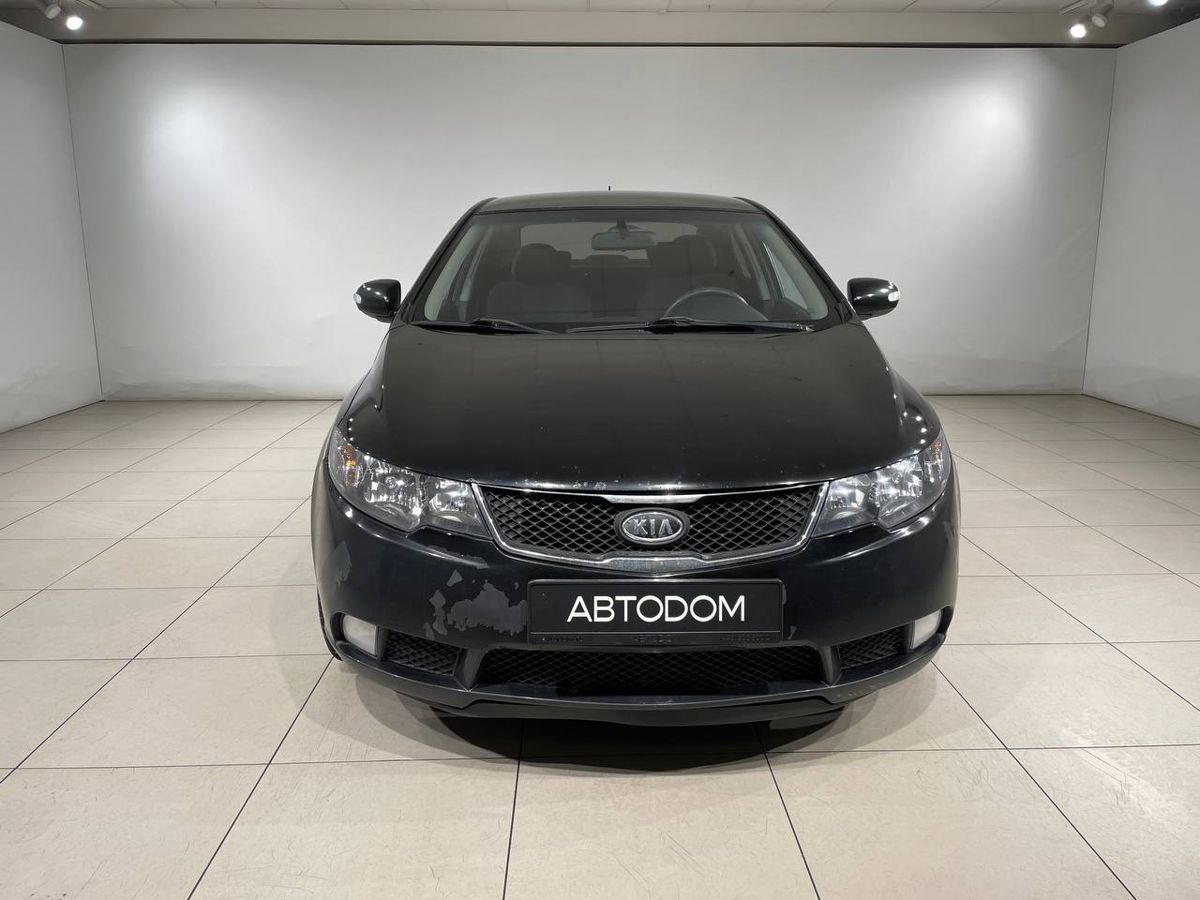Автомобиль Kia Cerato II поколение 4-speed 1.6 AT (126 л.с.) Base Чёрный 2009 с пробегом 150 018 км